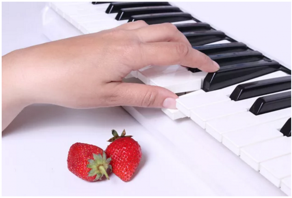 Strawberries and piano playing