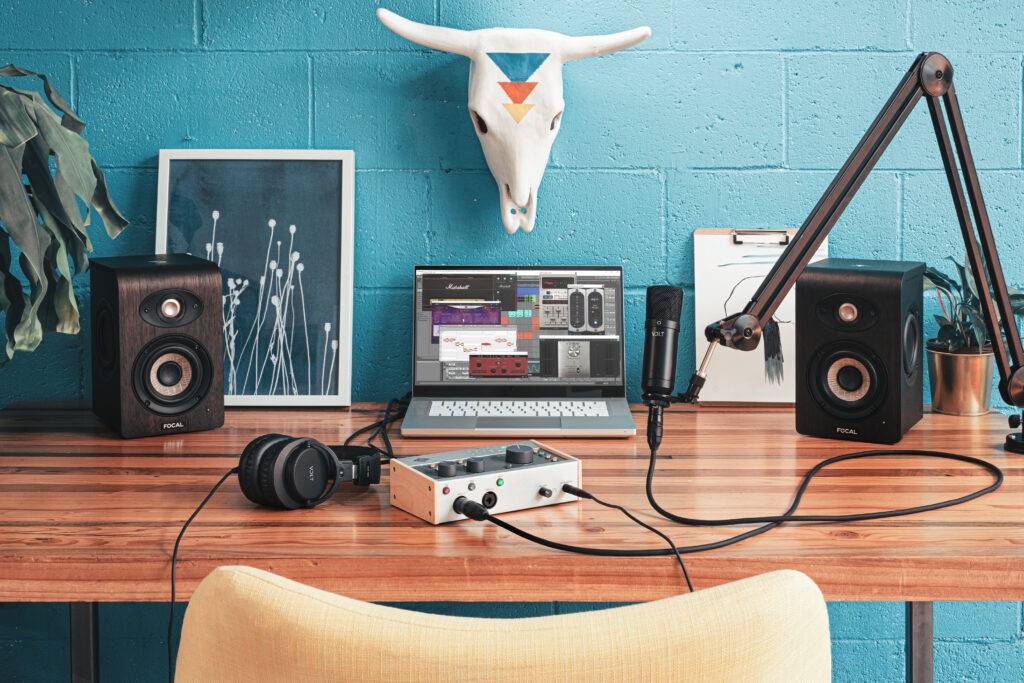 Lifestyle image of the Universal Audio Volt 476 USB audio interface. A great choice when building your first home studio.