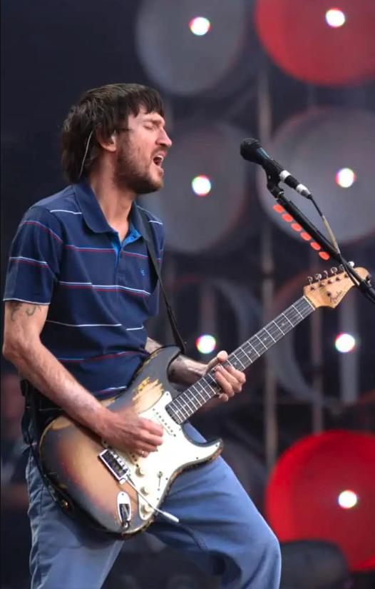Red Hot Chilli Peppers guitarist John Frusciante performing live with a sunburst Fender Stratocaster.