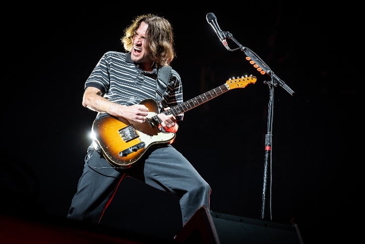 John Frusciante performing live with a sunburst Fender Telecaster Custom.