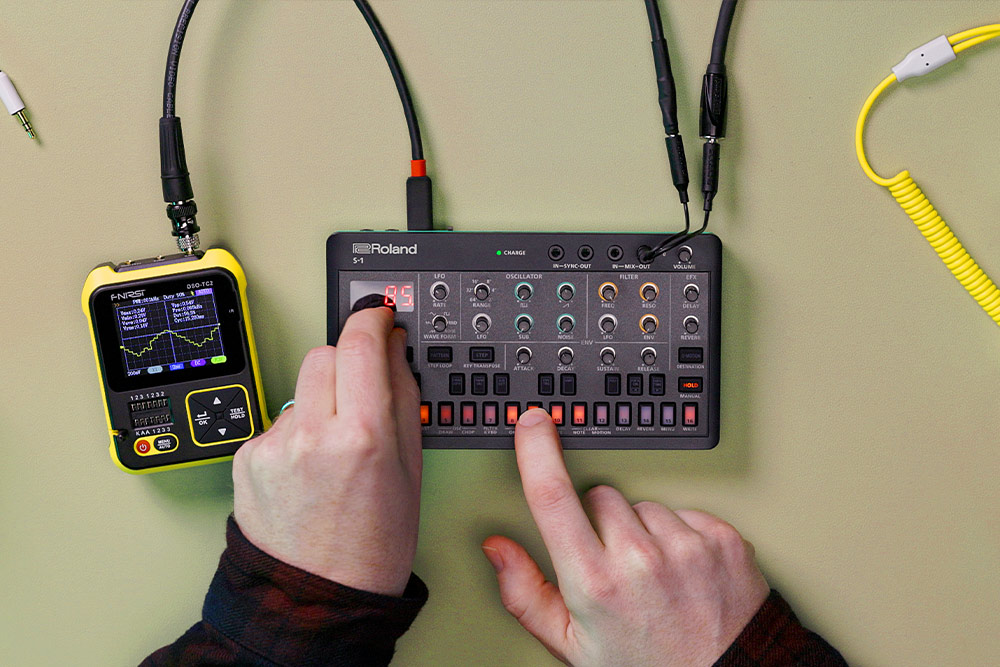Lifestyle photo of the Roland S-1 attached to an oscilloscope.